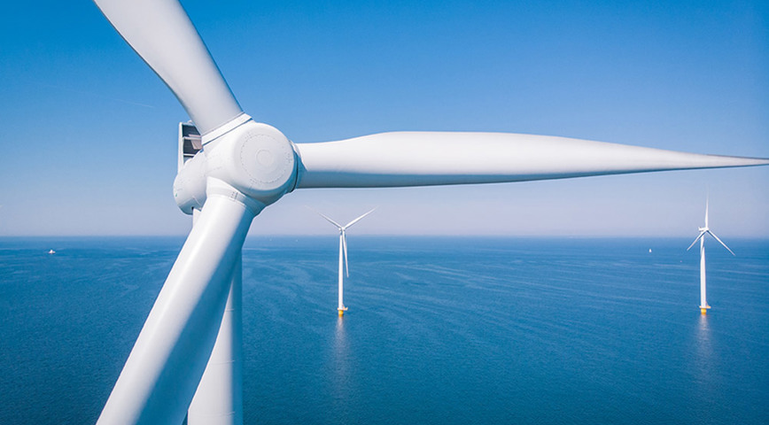 Offshore Wind Farm With Closeup Of A Turbine